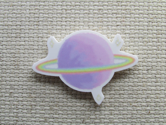 First view of the Purple Planet with Rings and Stars Needle Minder