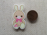 Second view of the Cute Bunny with a Pink Ribbon Needle Minder