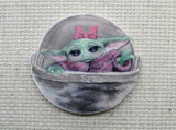 First view of the Alien Child with a Pink Bow Needle Minder