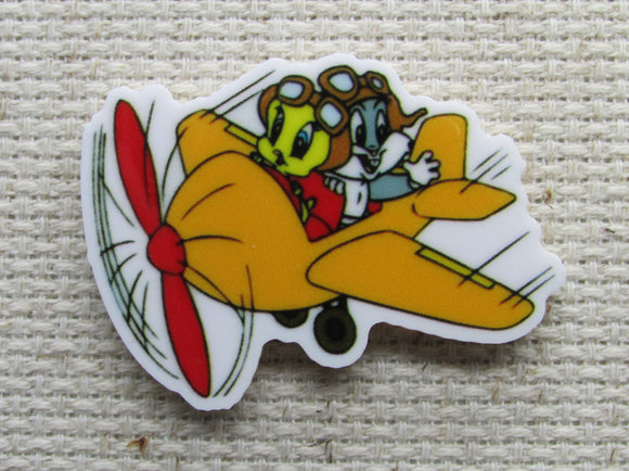 First view of the Baby Cartoon Characters Flying an Airplane Needle Minder