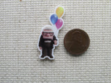 Second view of the Carl Holding Balloons Needle Minder