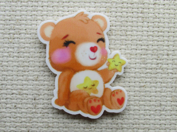 First view of the Orange Care Bear with Sleepy Star on Belly Needle Minder