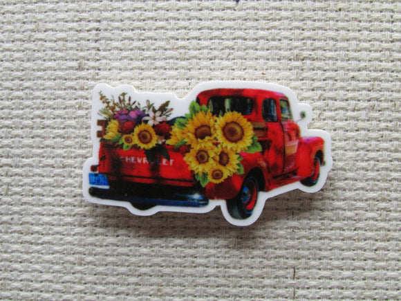 First view of the Red Truck of Sunflowers Needle Minder
