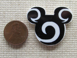 Second view of the Black and White Swirl Mouse Head Needle Minder