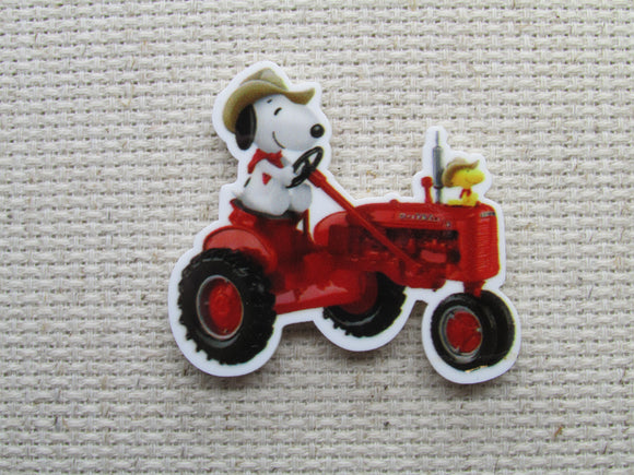First view of the Snoopy Riding a Tractor Needle Minder