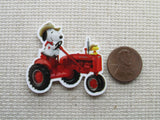Second view of the Snoopy Riding a Tractor Needle Minder