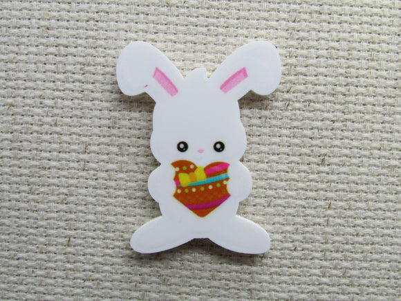 First view of the Easter Bunny Holding a Heart Needle Minder