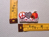 Third view of the Peace Love Fall Needle Minder
