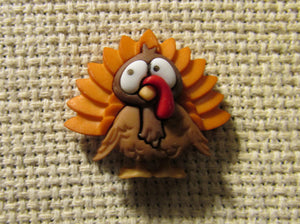 First view of the Orange Feathered Turkey Needle Minder