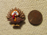 Second view of the Dark Brown Feathered Turkey Needle Minder