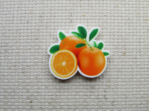 First view of the Oranges Needle Minder