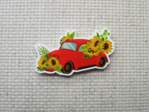 First view of the Sunflowers on a Red Bug Car Needle Minder