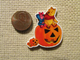 Second view of the Halloween Pooh and Piglet Sitting on a Jack O Lantern Needle Minder