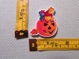 Third view of the Halloween Pooh and Piglet Sitting on a Jack O Lantern Needle Minder