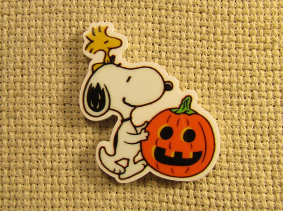First view of the Snoopy and Woodstock with a Jack O Lantern Needle Minder