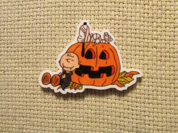 First view of the Vampire Charlie Brown with Mummy Snoopy with a Jack O Lantern Needle Minder