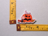 Third view of the Vampire Charlie Brown with Mummy Snoopy with a Jack O Lantern Needle Minder