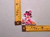 Third view of the Minnie Mouse Dressed as a Pink Witch Needle Minder