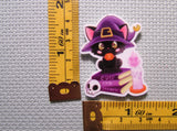 Third view of the Black Cat Sitting on Spell Books Needle Minder