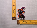 Third view of the Black Cat Dressed as a Witch Needle Minder