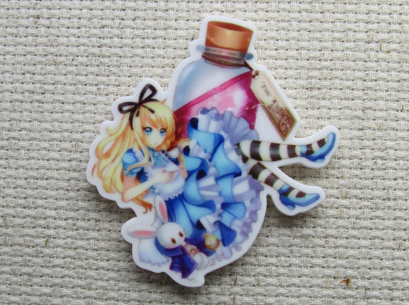 First view of the Alice with the White Rabbit and a Drink Me Bottle Needle Minder
