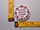 Third view of the Blossom Wherever Life Plants You Flower Wreath Needle Minder