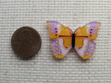 Second view of the Orange and Purple Butterfly Needle Minder