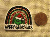 Third view of the Rainbow Grinch Needle Minder