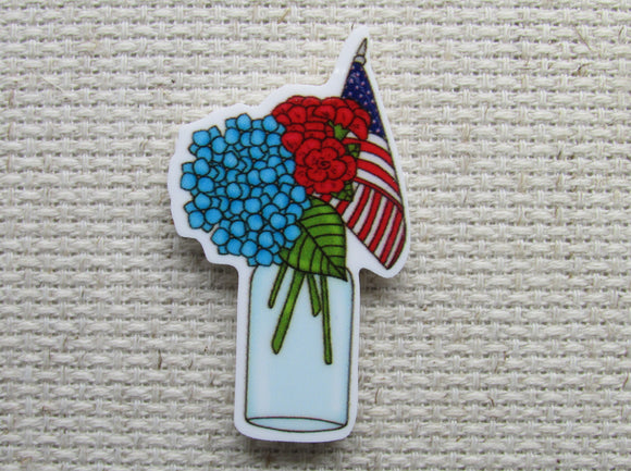 First view of the Blue and Red Flowers in a Vase with an American Flag Needle Minder