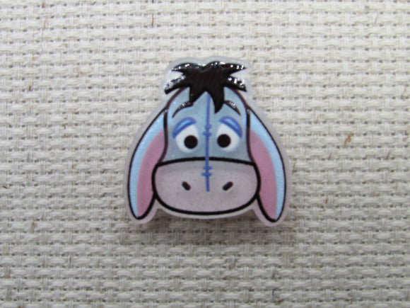 First view of the Small Eeyore Face Needle Minder