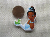 Second view of the Princess and the Frog Tiana Holding a Frog Needle Minder