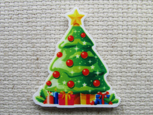 First view of the Beautiful Christmas Tree Decorated with Red Ornaments Needle Minder