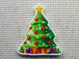 First view of the Beautiful Christmas Tree Decorated with Red Ornaments Needle Minder