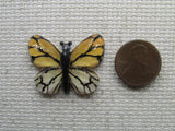 Third view of the Yellow Butterfly Needle Minder 