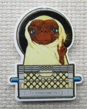 Close up view of alien in a basket needle minder.