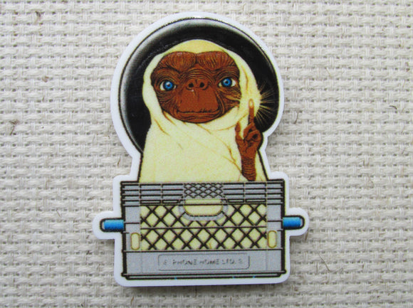 First view of alien in a basket needle minder.