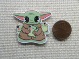 Third view of Alien Child Surrounded by Frogs Needle Minder.