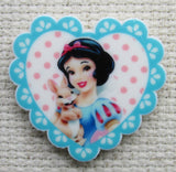 Second view of Snow White with a Bunny in a Blue Fringed Heart Needle Minder.