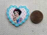 Third view of Snow White with a Bunny in a Blue Fringed Heart Needle Minder.