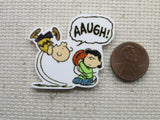 Third view of Lucy pulling the football away as Charlie Brown tries to kick it needle minder.