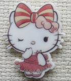 Second view of Winking Pretty White Kitty with a Striped Pink Bow Needle Minder.