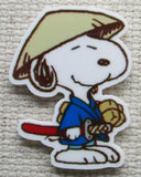 Second view of Snoopy as a Karate Sensei needle minder.