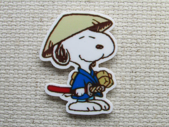 First view of Snoopy as a Karate Sensei needle minder.
