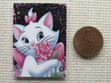 Third view of Aristrocats Marie with a Pink Flower Needle Minder.