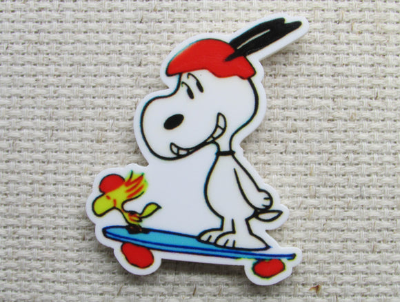 First view of Snoopy on a Skateboard Needle Minder.