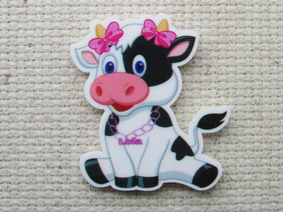 First view of a cow with the name Lola needle minder.
