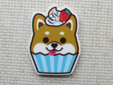 Second view of corgi cupcake needle minder.