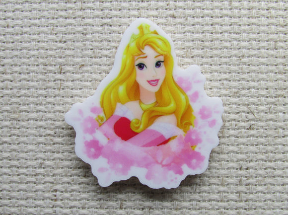 First view of Princess Aurora in a Puff of Pink Needle Minder.