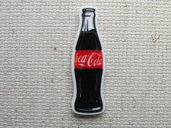 First view of Bottle of Coca~Cola Needle Minder.