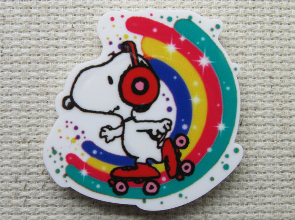 First view of rainbow skating Snoopy needle minder.